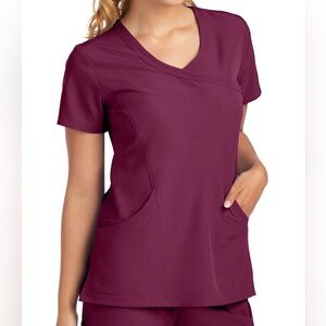 4 Wine Color Skechers scrubs size small. Like new. Comfortable and stylish.